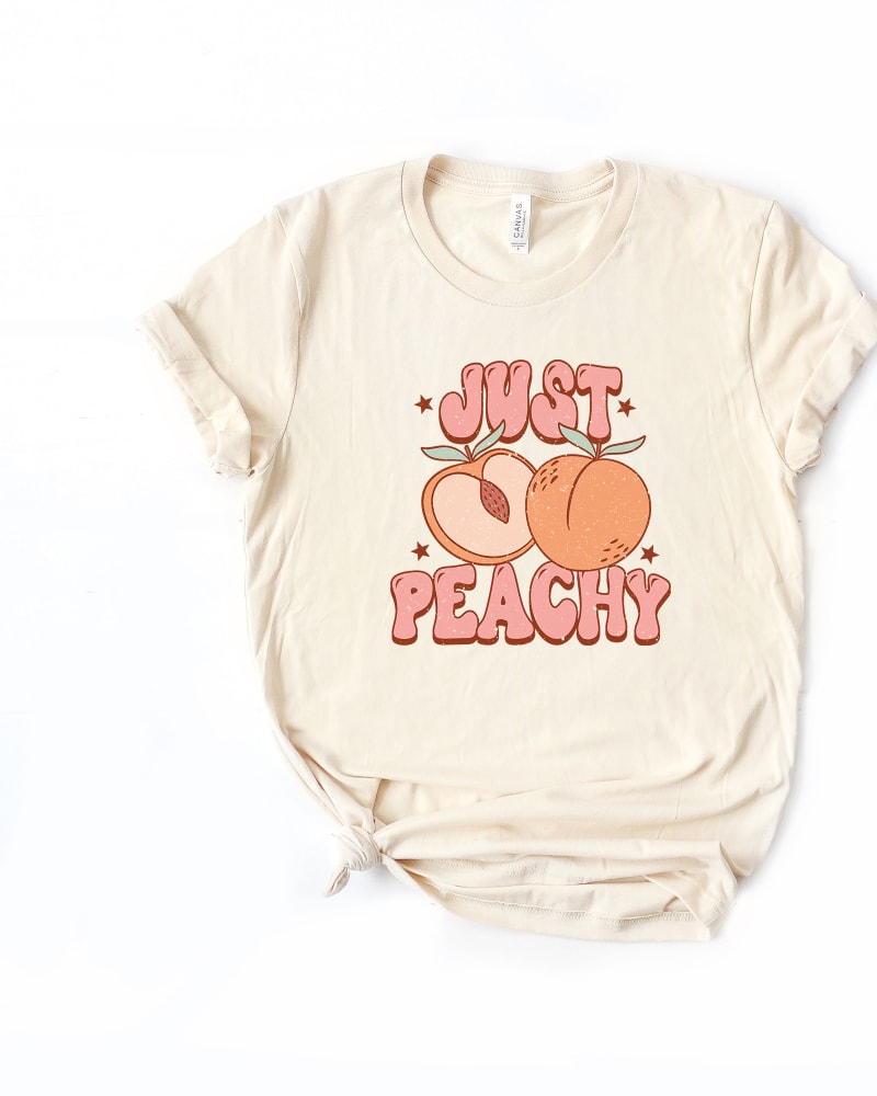 Front of a size 2XL Just Peachy Colorful Peach Short Sleeve Graphic Tee in Cream by Simply Sage Market. | dia_product_style_image_id:295491